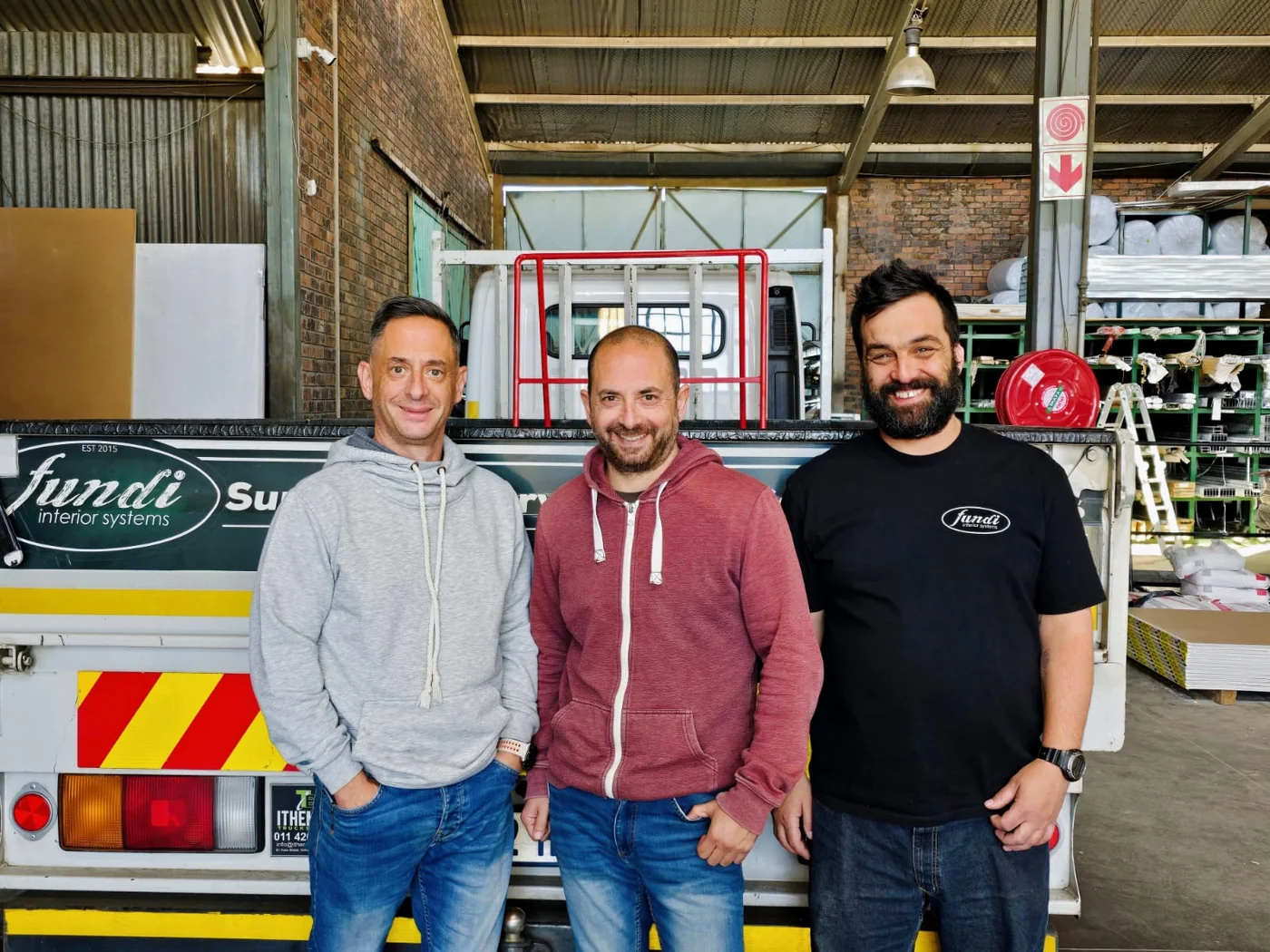George, Harry and Tyrone — Fundi Sales and Operations team at the delivery truck
